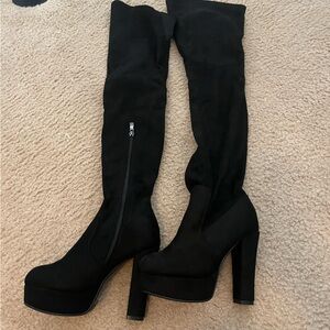 Thigh high heel boots